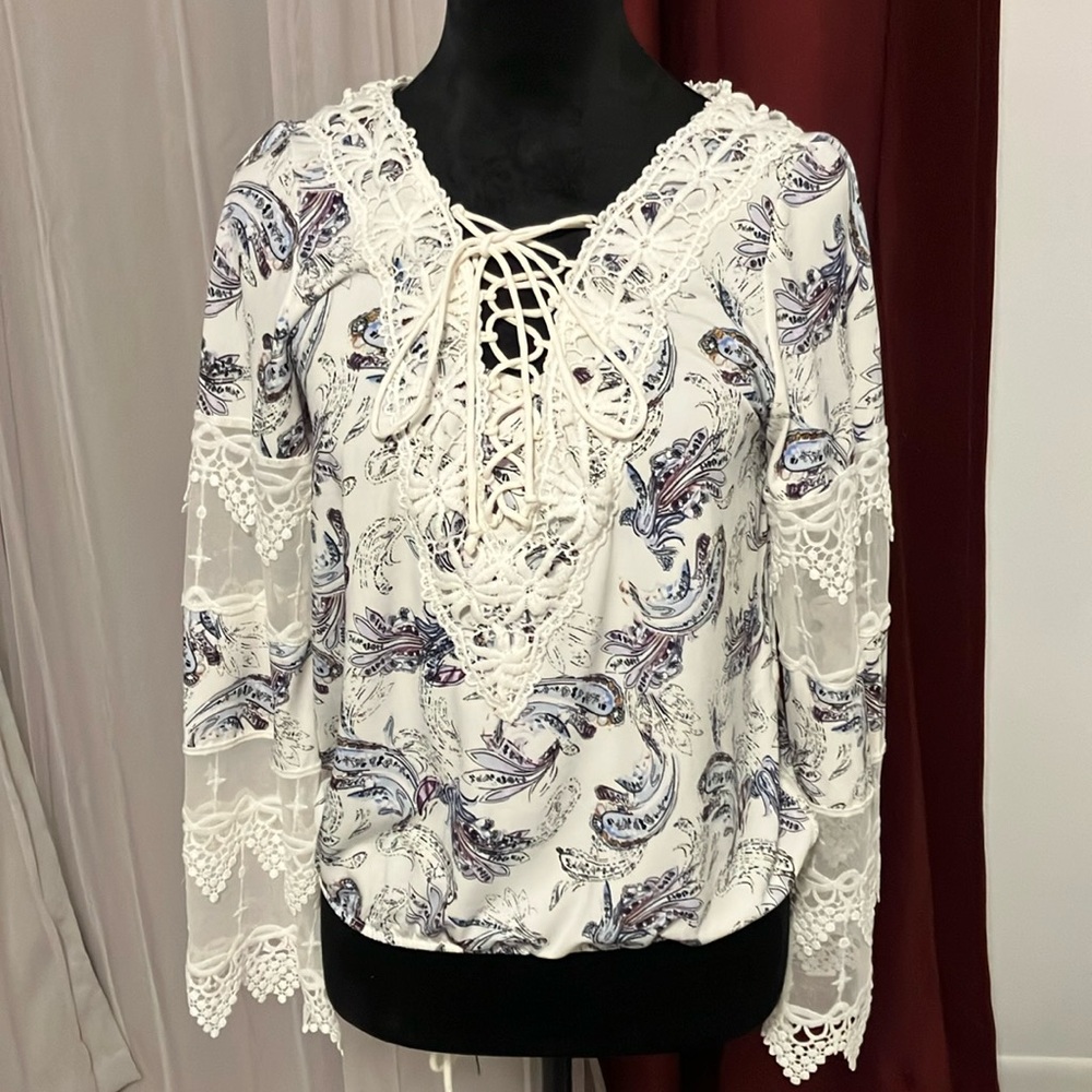 A beautiful long sleeved blouse.